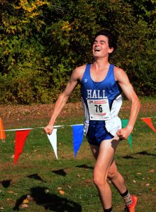 MANCHESTER 10-25-2014 Hall High Ari Klau celebrates as he approaches the finish lane during a CIAC Class boys and girls cross country championships Saturday afternoon at Wickham Park in Manchester Ari won first place (Marc-Yves Regis I, special to the Courant)